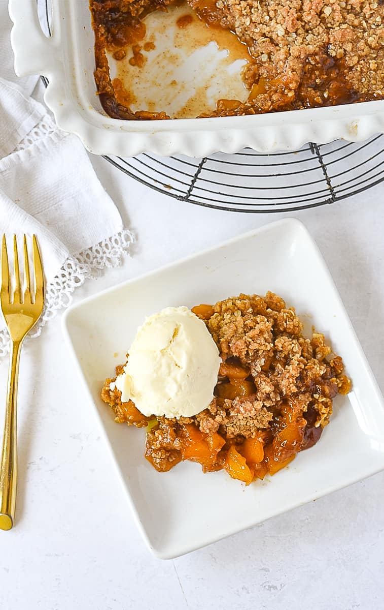 overhead shot of mango crumble on a plate