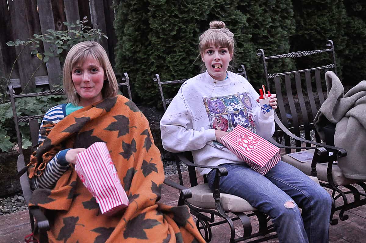 girls eating popcorn