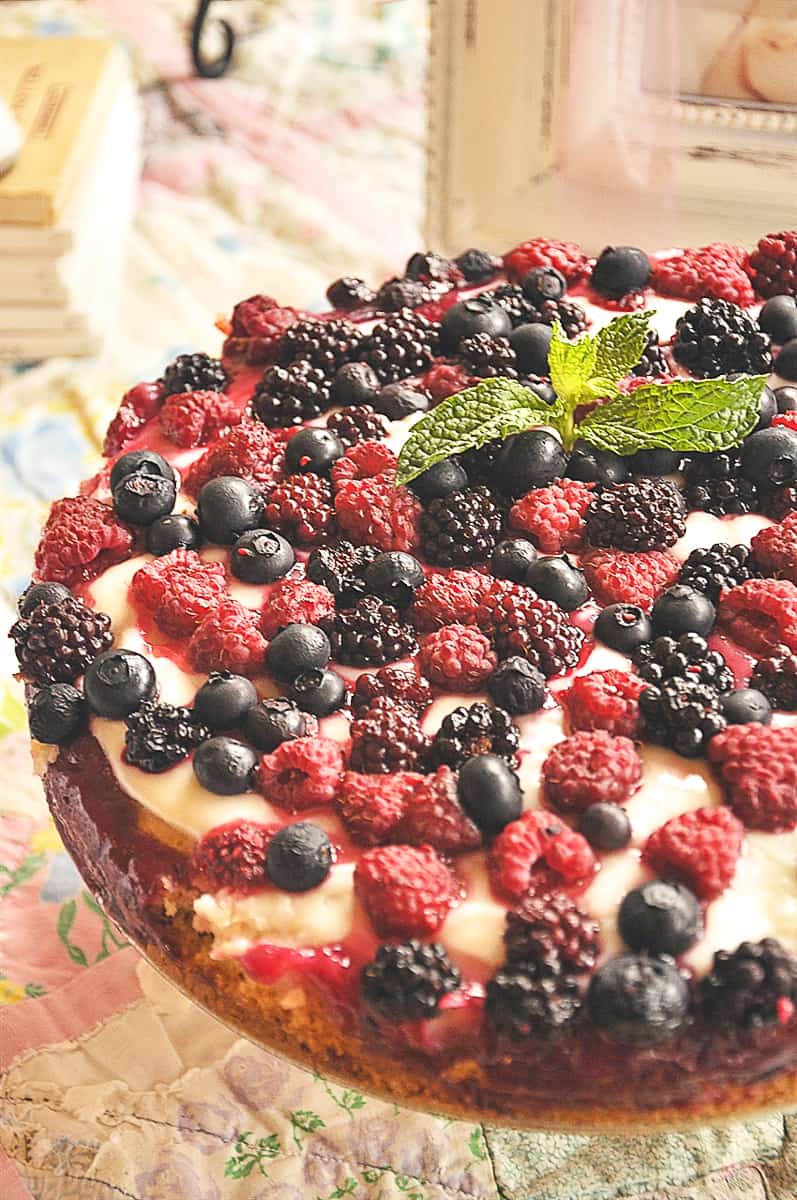 ooey gooey butter cake with berries on top