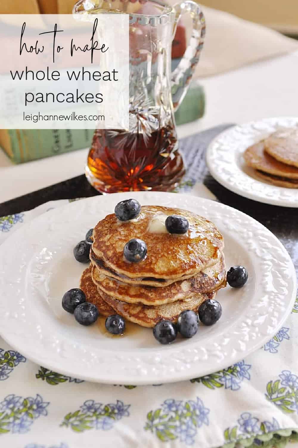 pancakes on a plate with blueberries on top