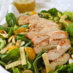chicken on a bed of spinach
