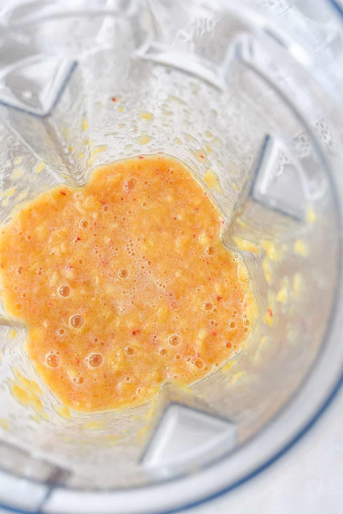 blender of pureed peachess