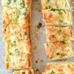 overhead shot of sliced garlic cheese bread