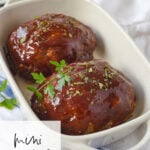 Two mini meatloaves in a dish