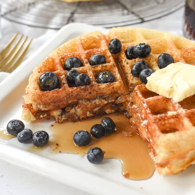 waffles with blueberries and syrup