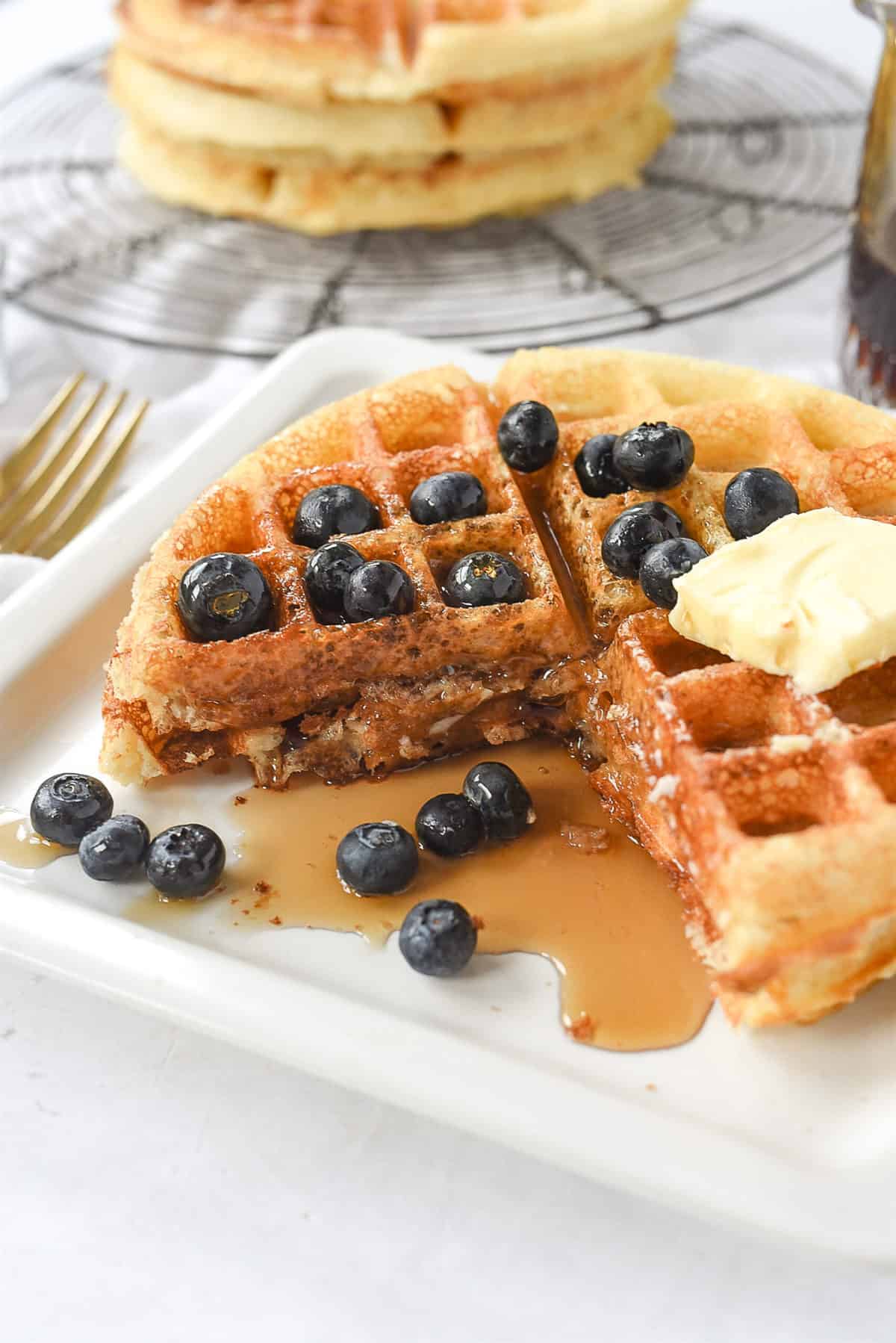 waffles with blueberries and syrup