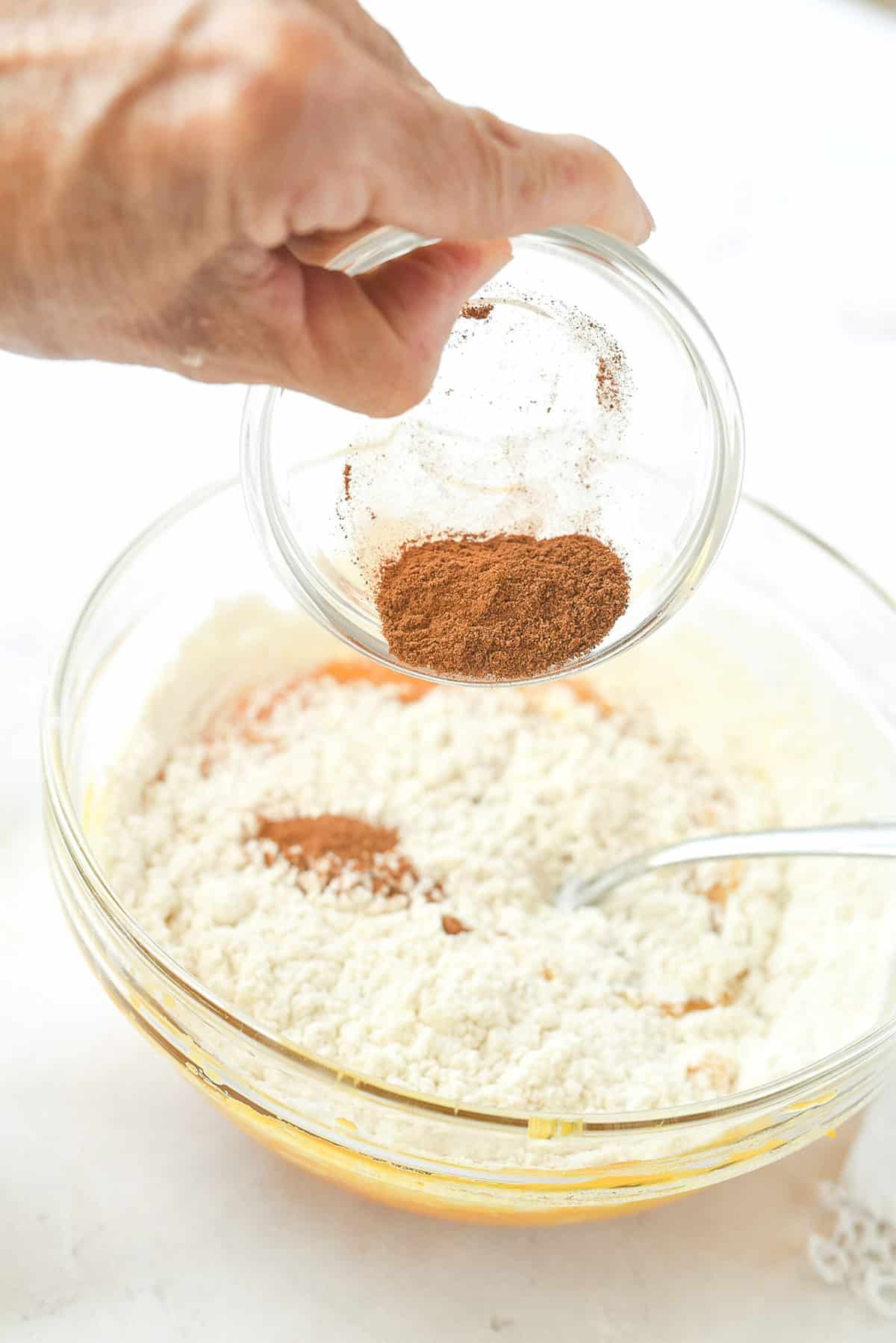 adding cinnamon to pumpkin bar batter