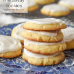 stack of four frosted almond cookies