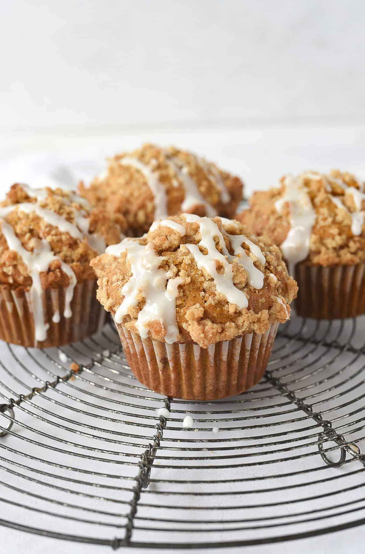 up close photo of pumpkin muffin with streusel topping