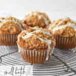 glazed pumpkin muffins on cooling rack