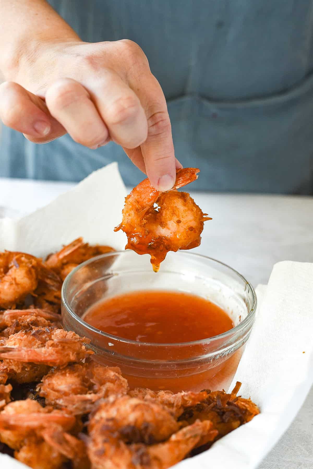 dipping shrimp in sauce