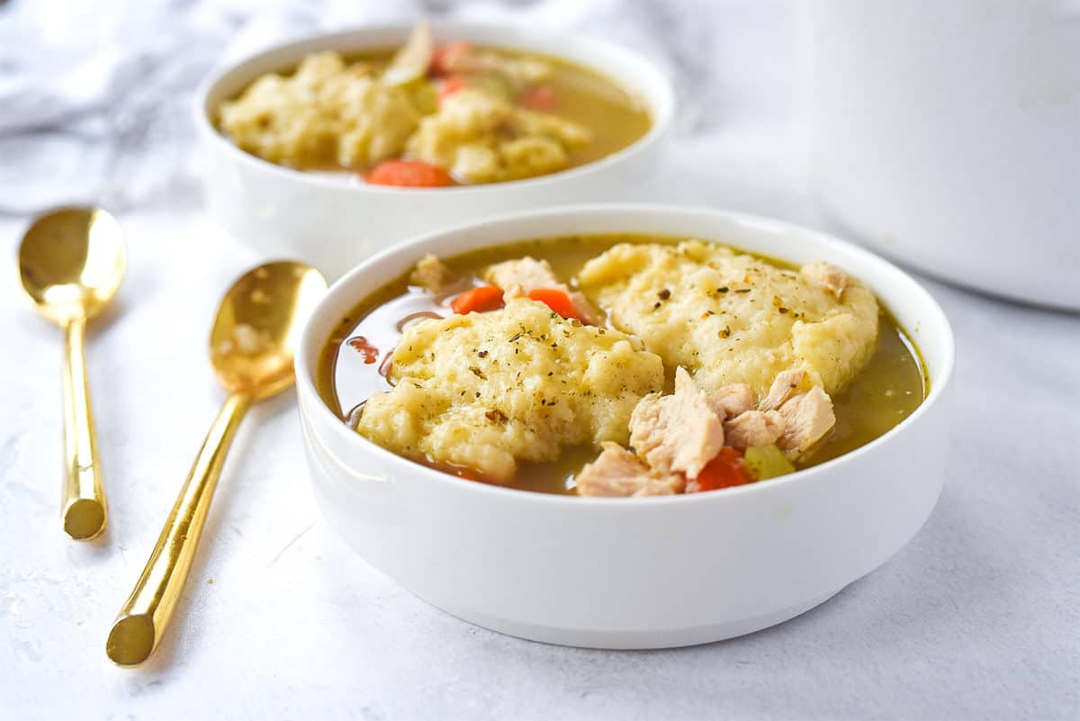 two bowls of chicken and dumplings