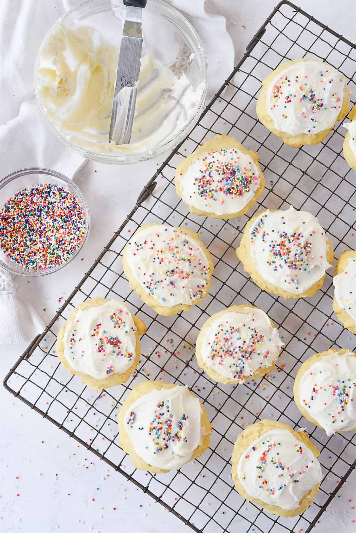 overhead shot of decorating sour cream cookies