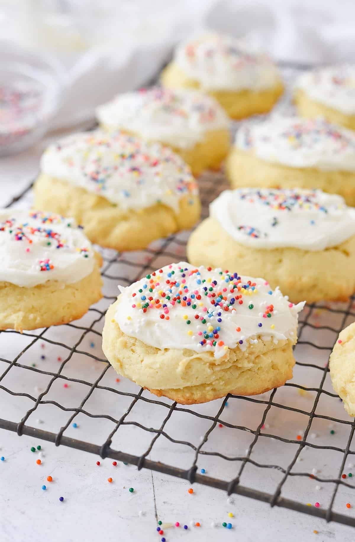 sour cream cookies on a cooling rack