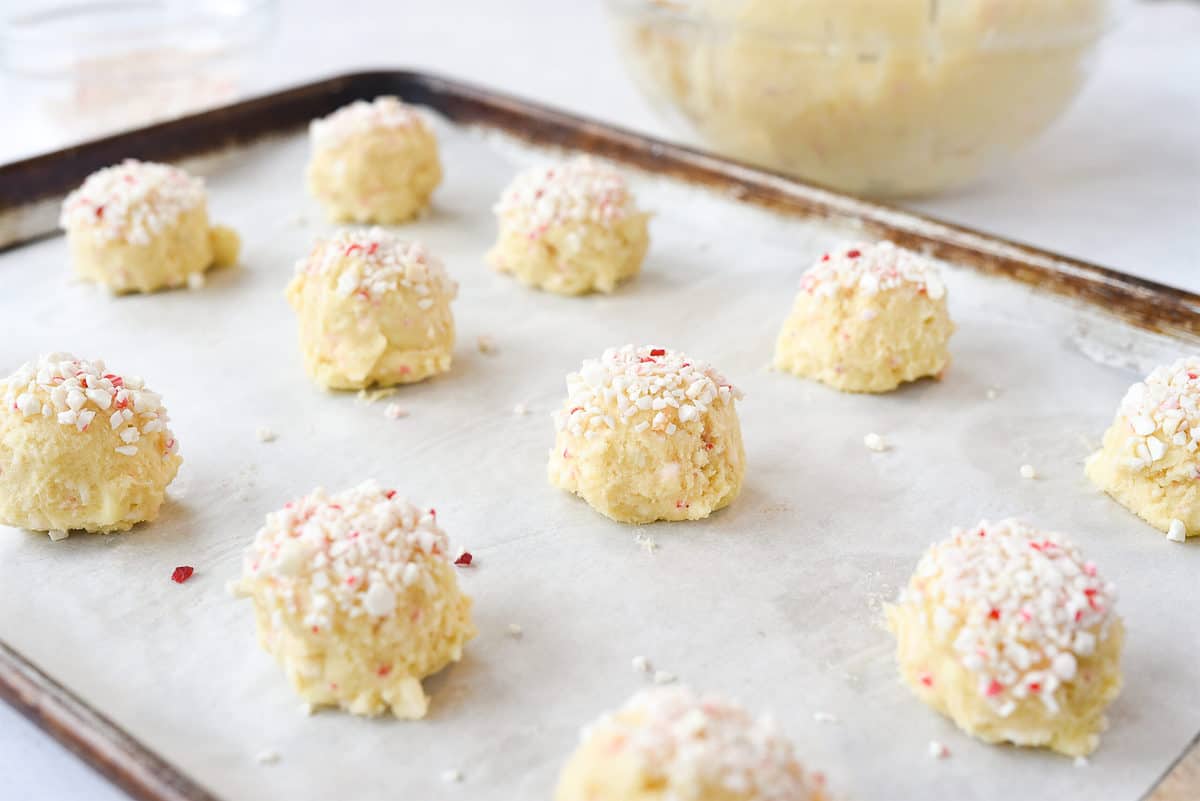 balls of cookie dough on baking sheet