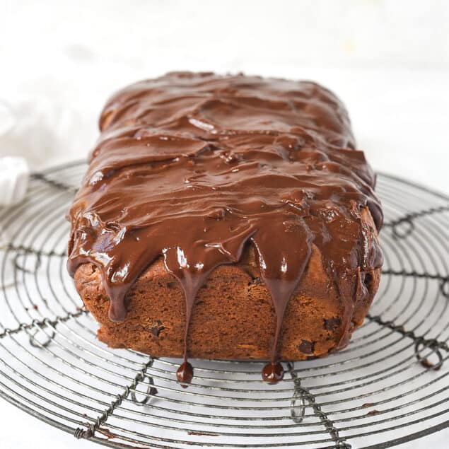 loaf of chocolate chip cinnamon bread on cooling rack