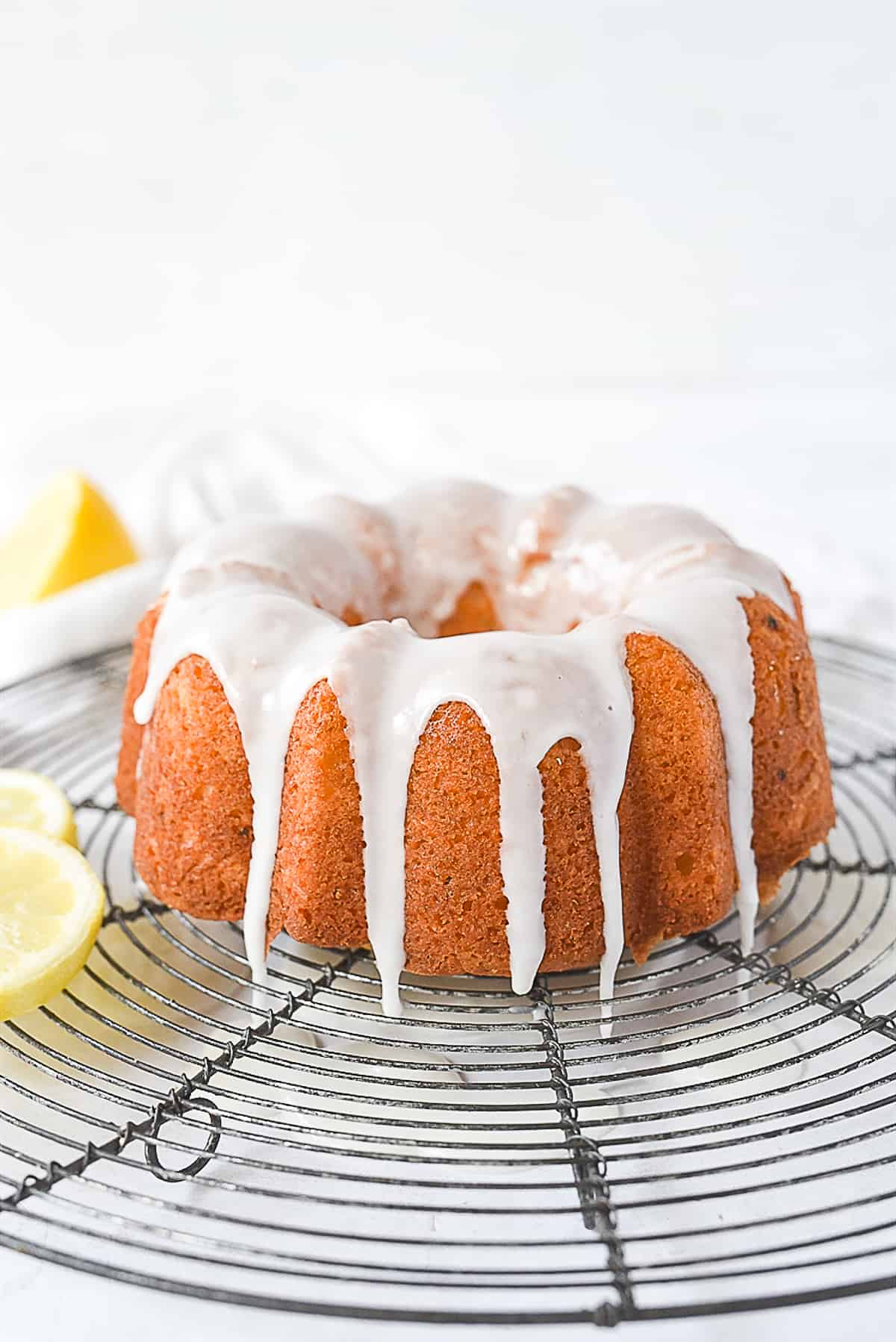 glazed lemon yogurt cake on rack