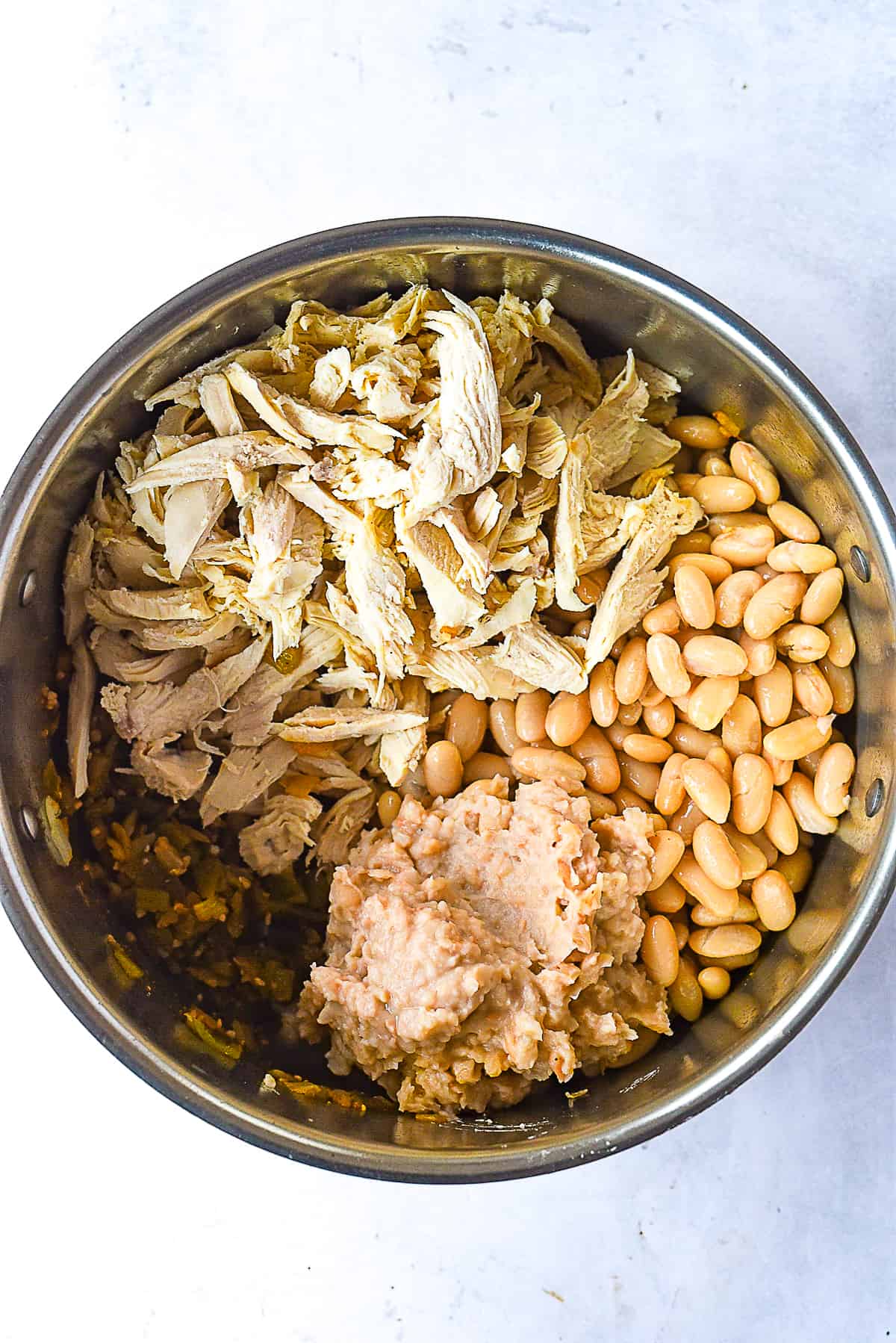 pot with beans, chicken 