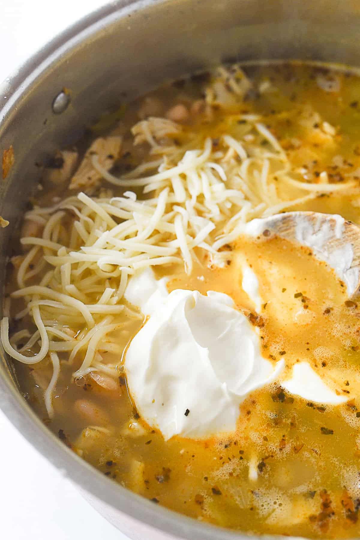 adding cheese and sour cream to chili