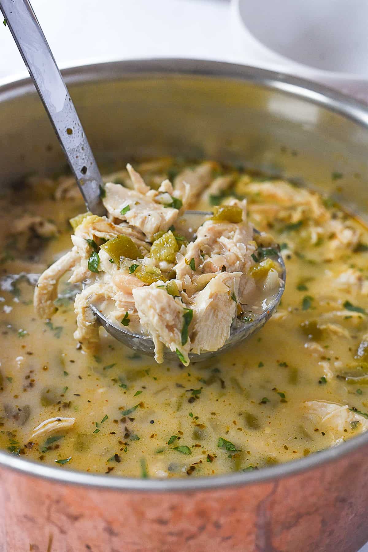 ladle full of white chicken chili