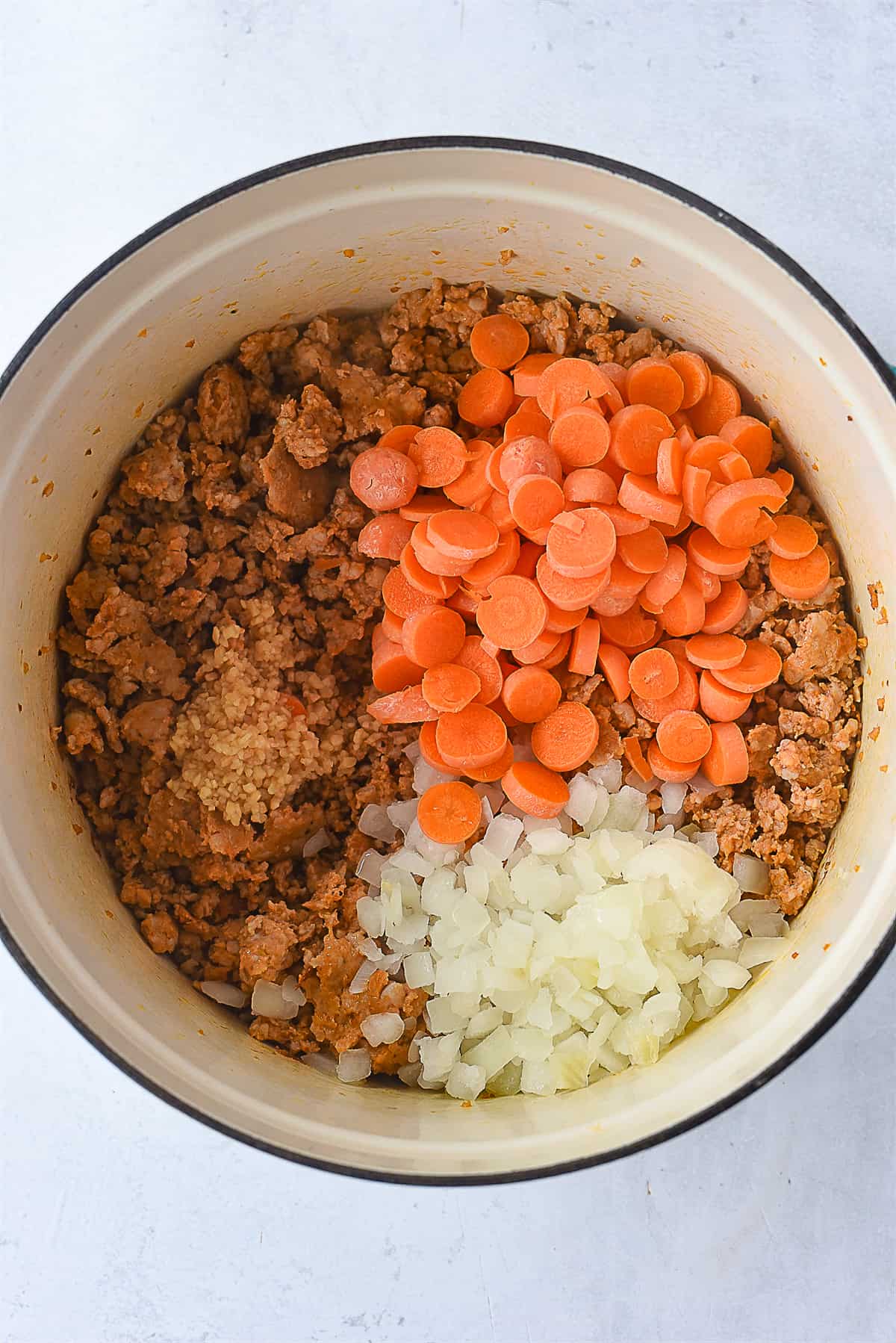 overhead shot of soup ingredients in pot