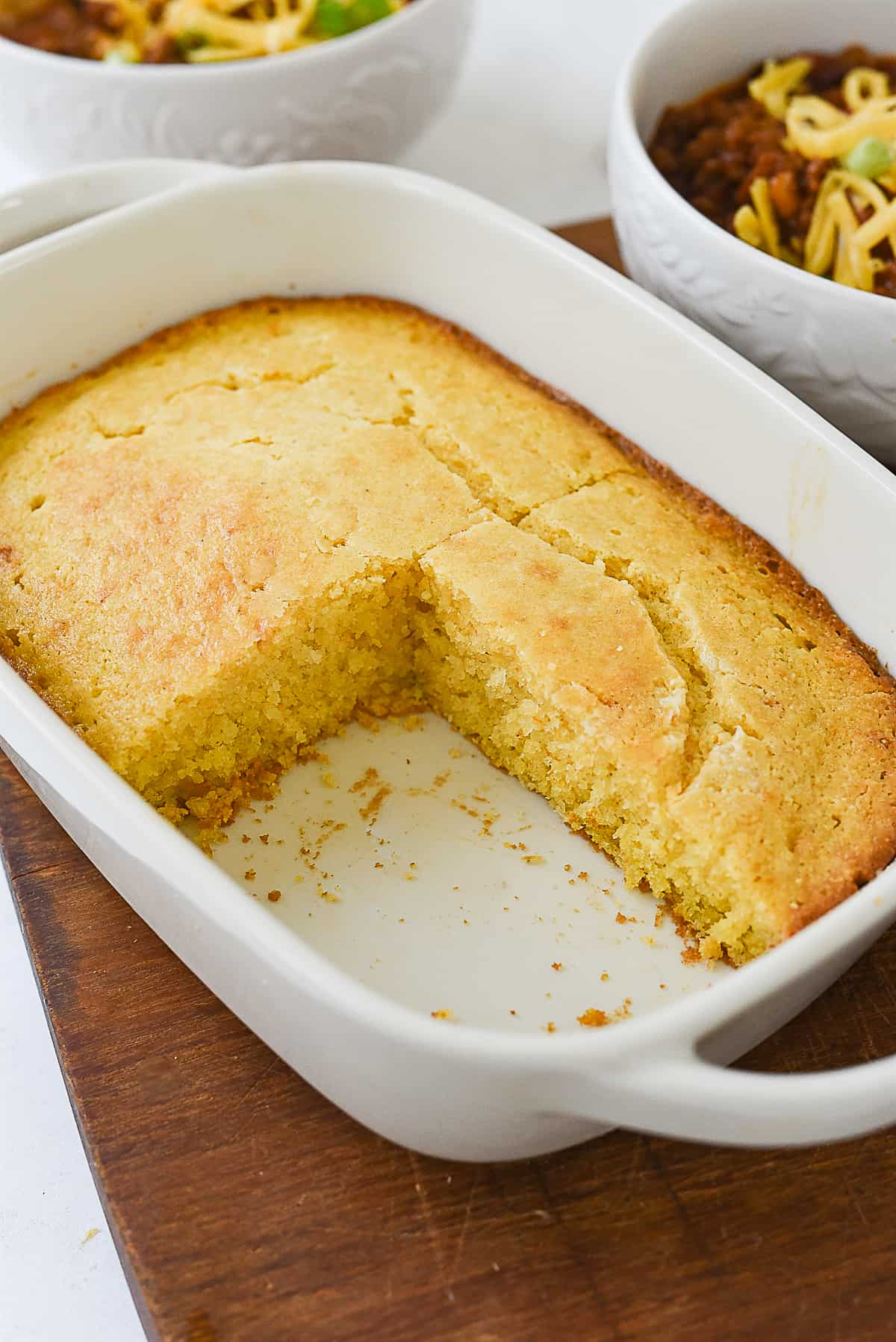 pan of cornbread with piece missing