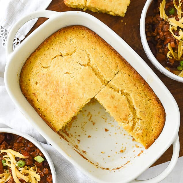 overhead shot of small batch cornbread with two bowls of chili