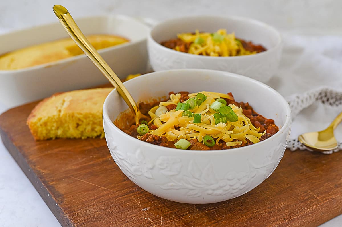 bowl of chili with a spoon in it.