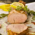 lemon pork tenderloin on a baking sheet