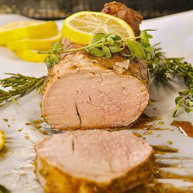 lemon pork tenderloin on a baking sheet