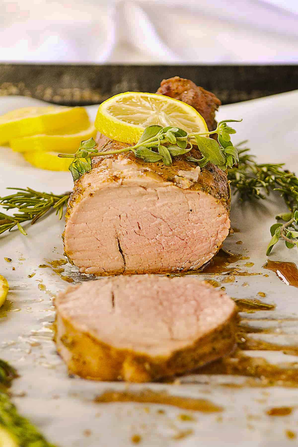 lemon pork tenderloin on a baking sheet