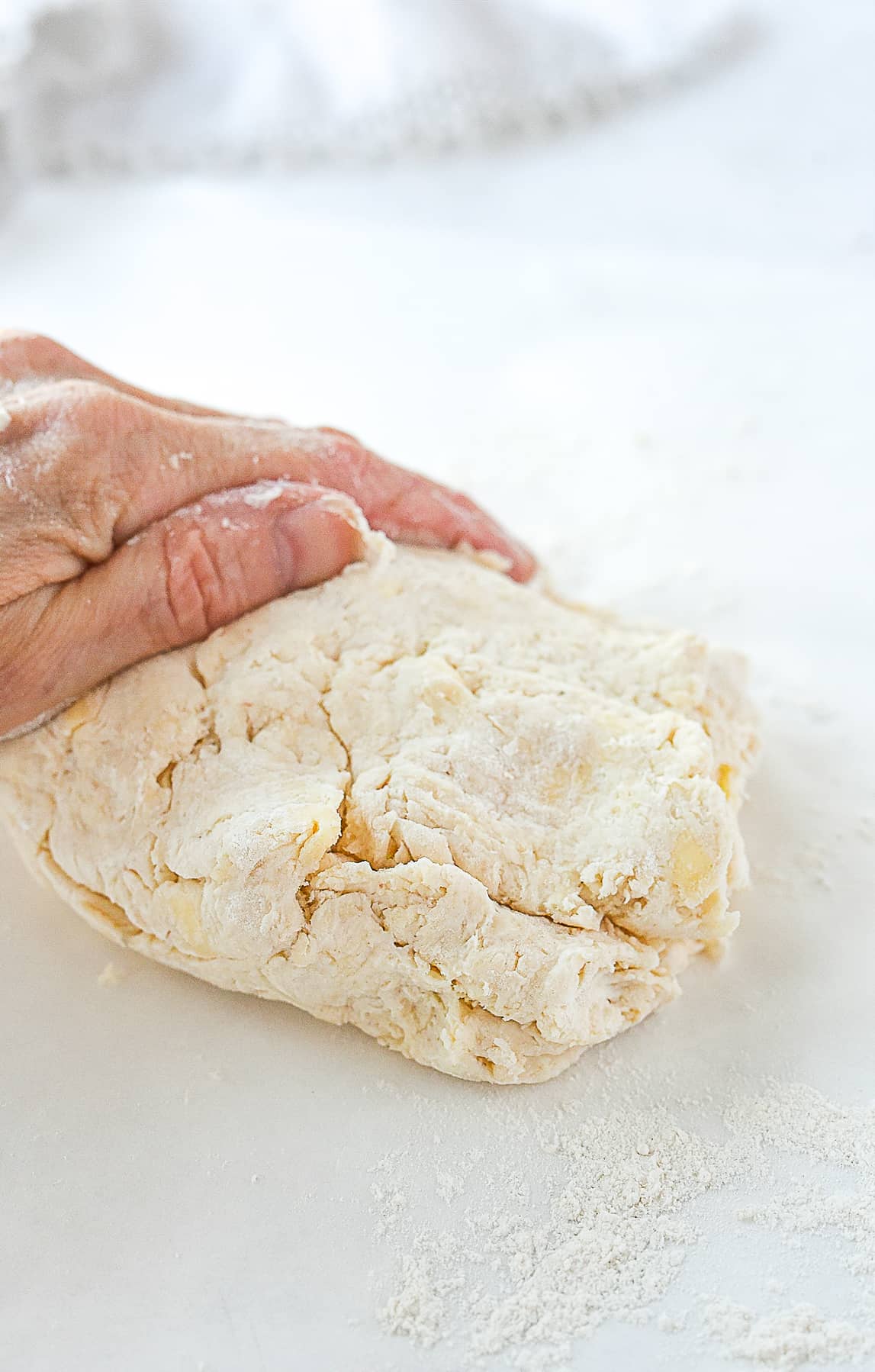 kneading biscuit dough