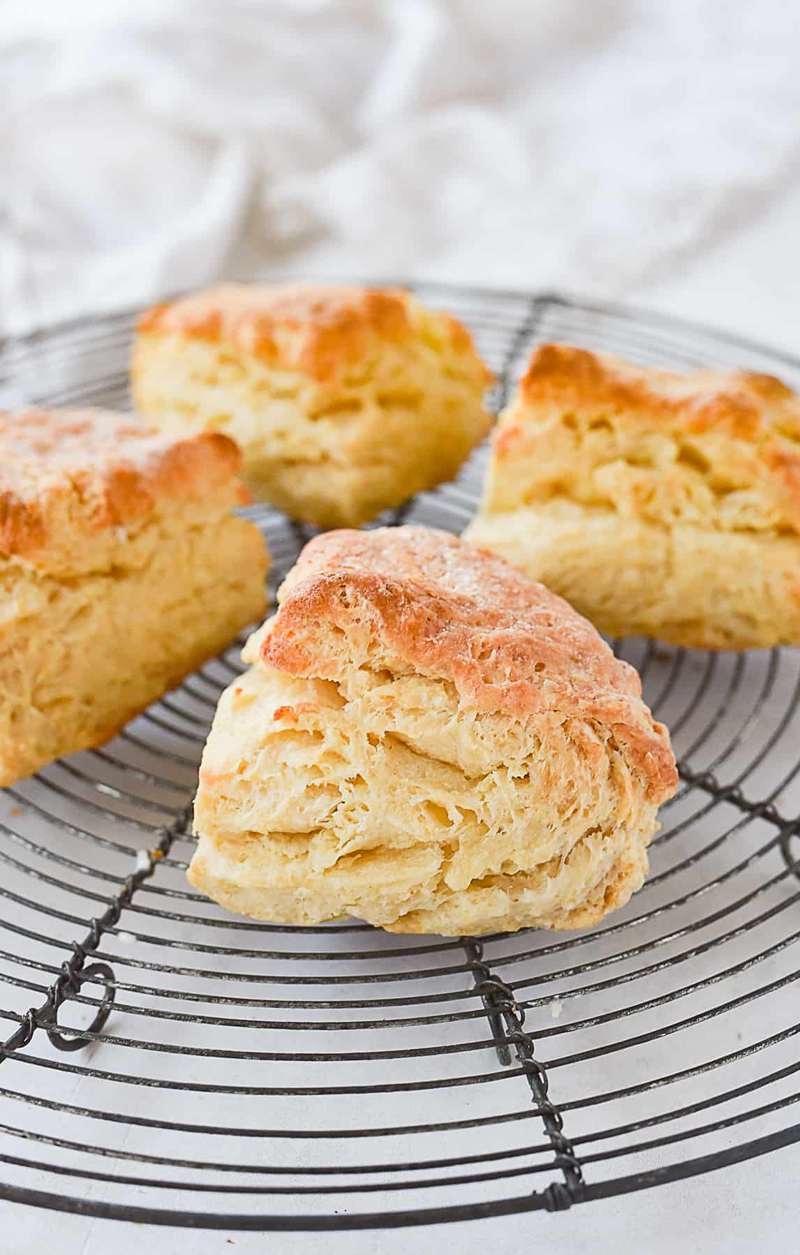 four biscuits on a cooling rack