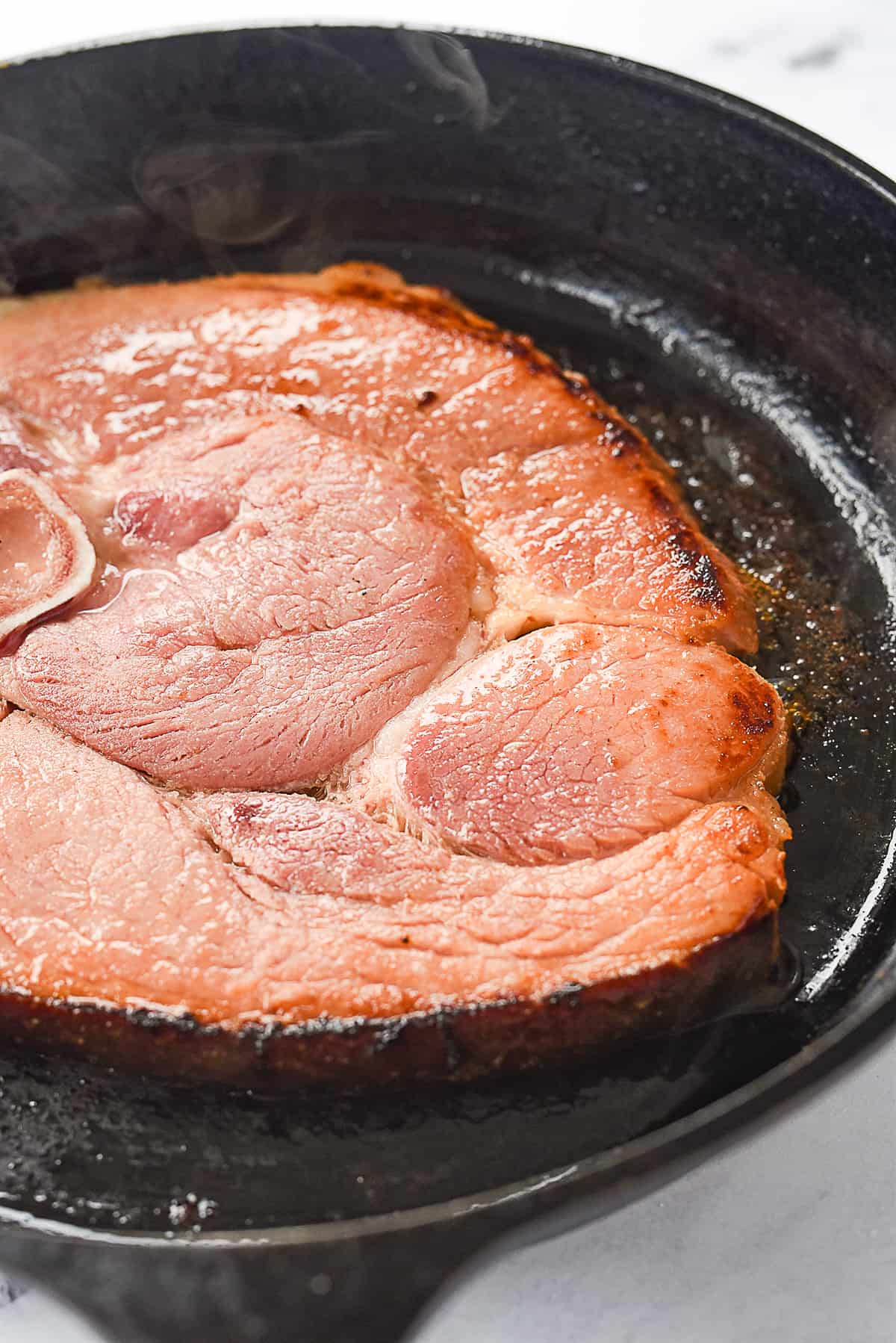 browning ham steak in pan