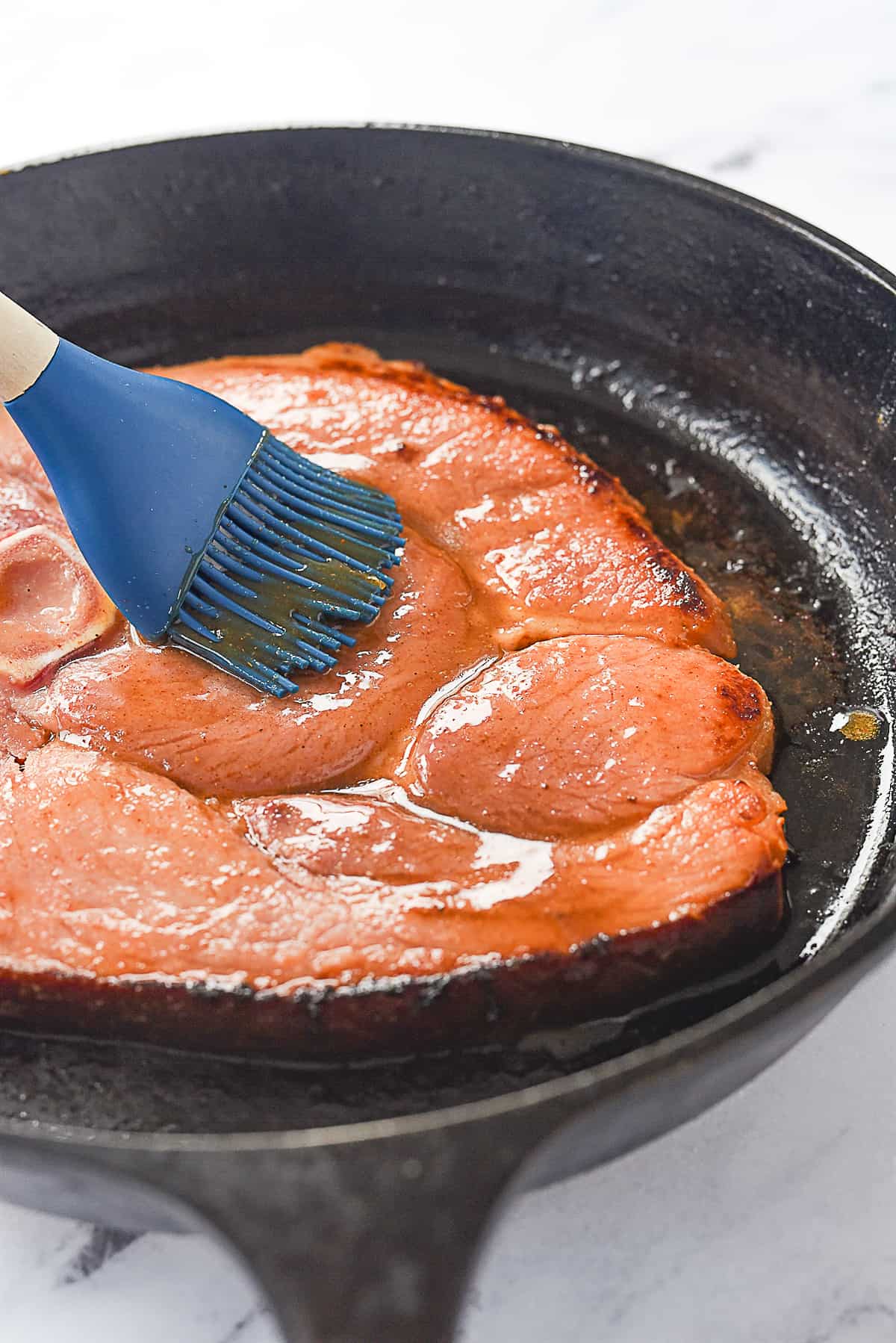 glazing ham in cast iron pan