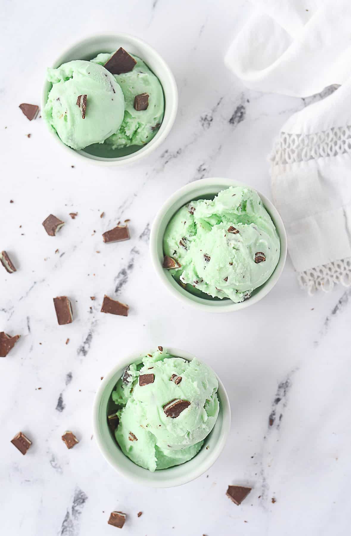 three bowls of mint chocolate chip ice cream