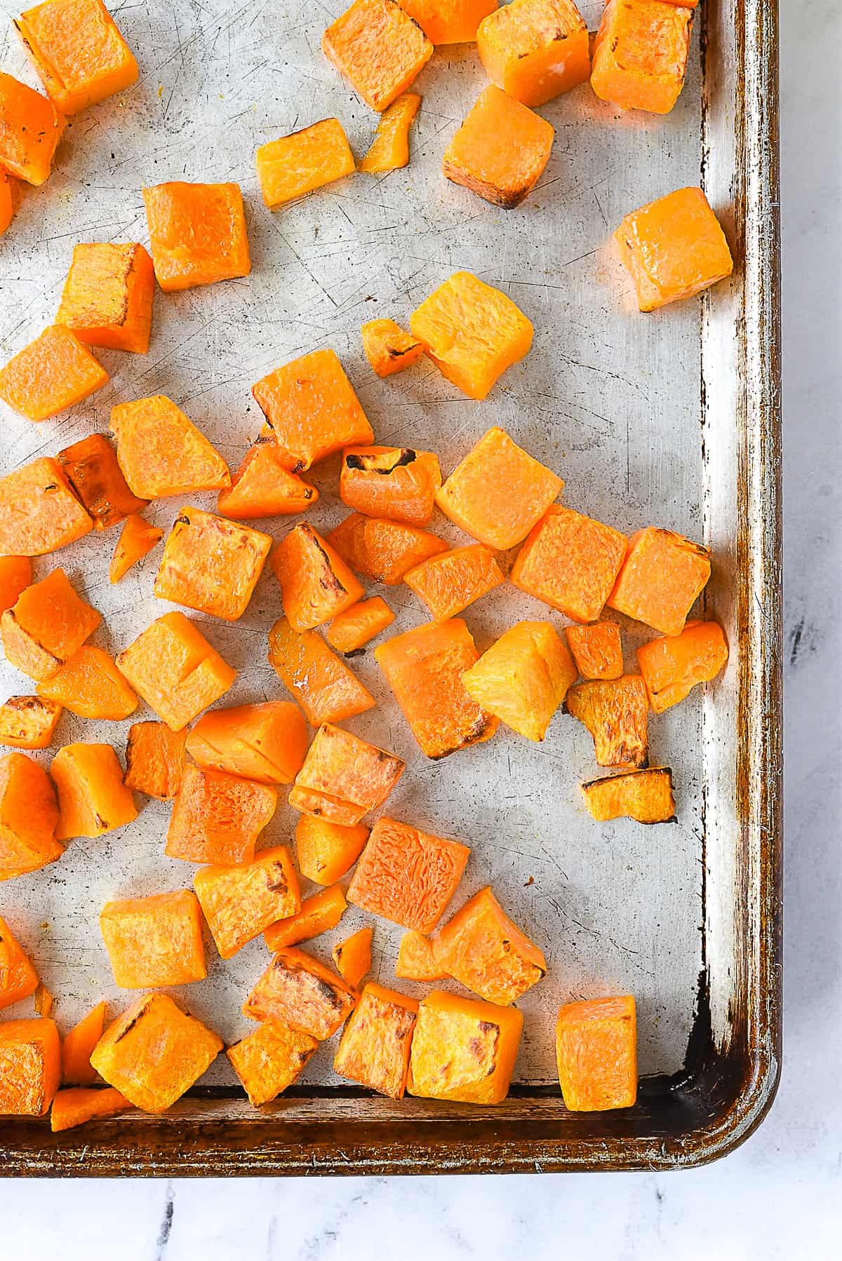 roasted butternut squash on a baking sheet