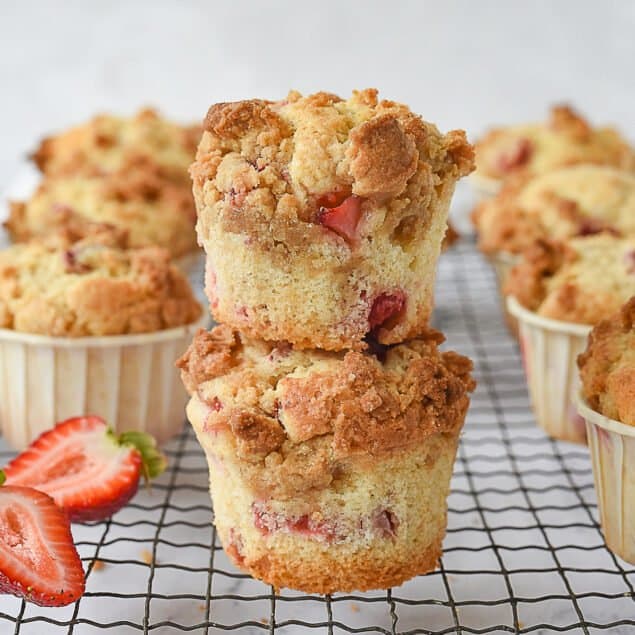 two strawberry muffins stacked on top of each other