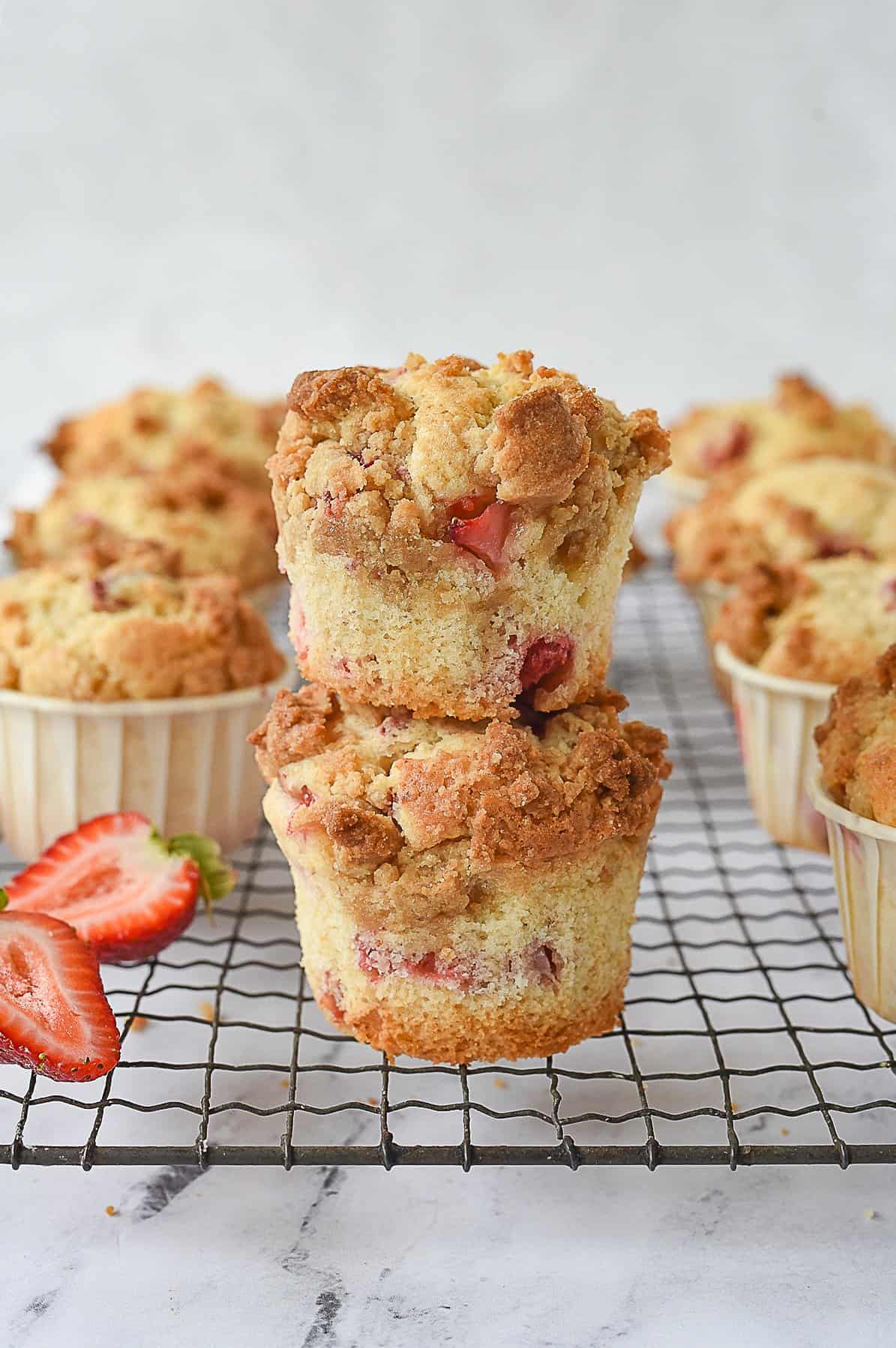 two strawberry muffins stacked on top of each other