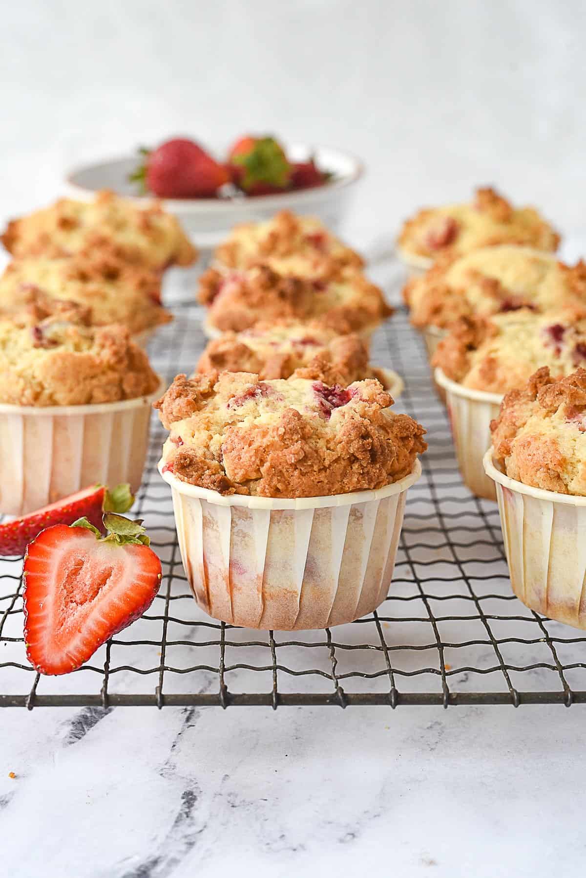 strawberry muffins cooling on a rack