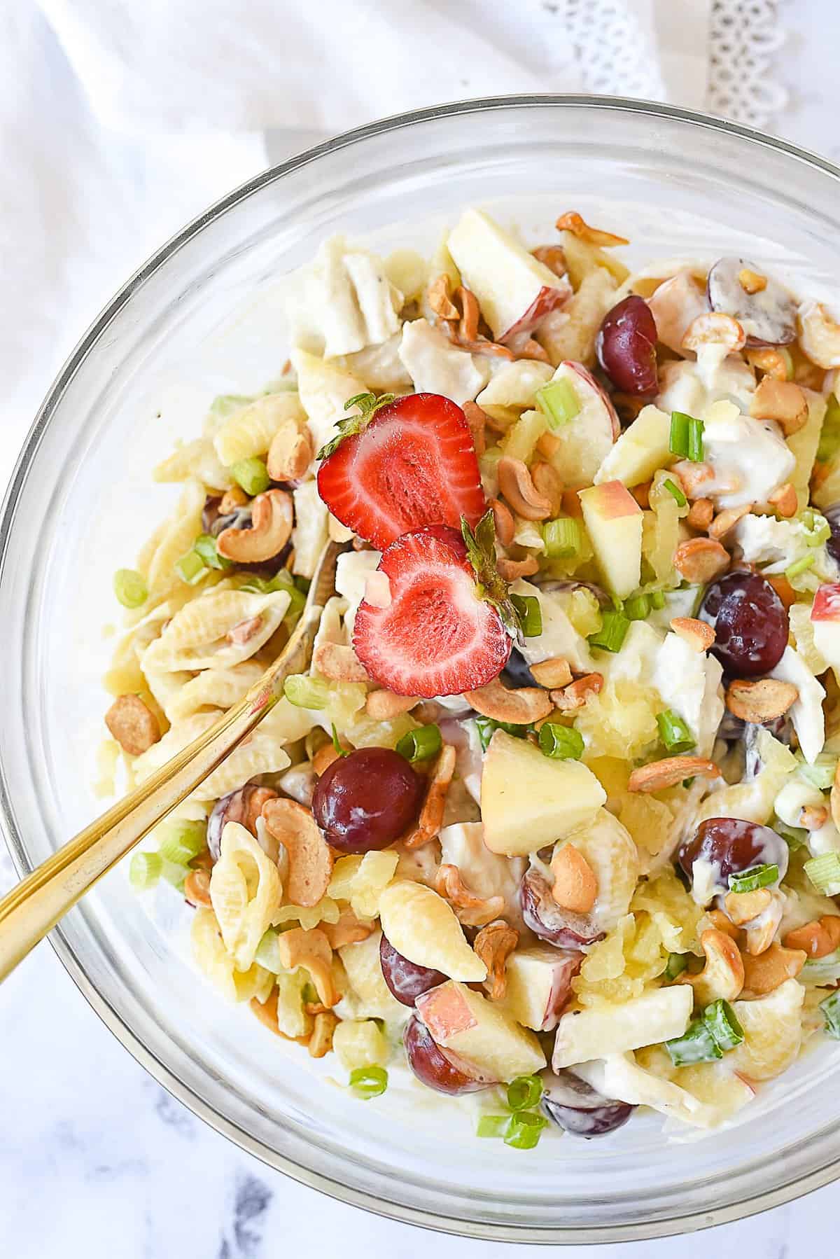 bowl of chicken salad with pasta.