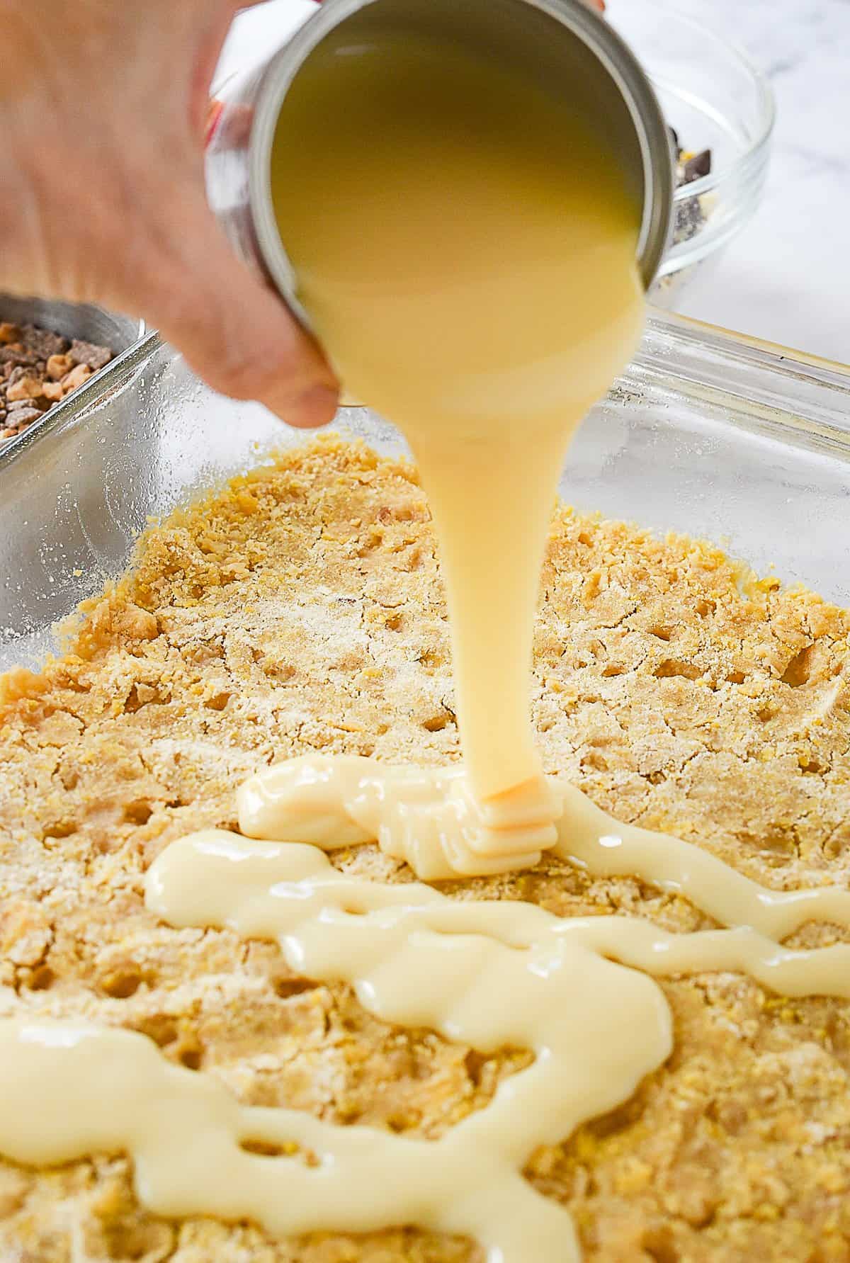 pouring milk over crust