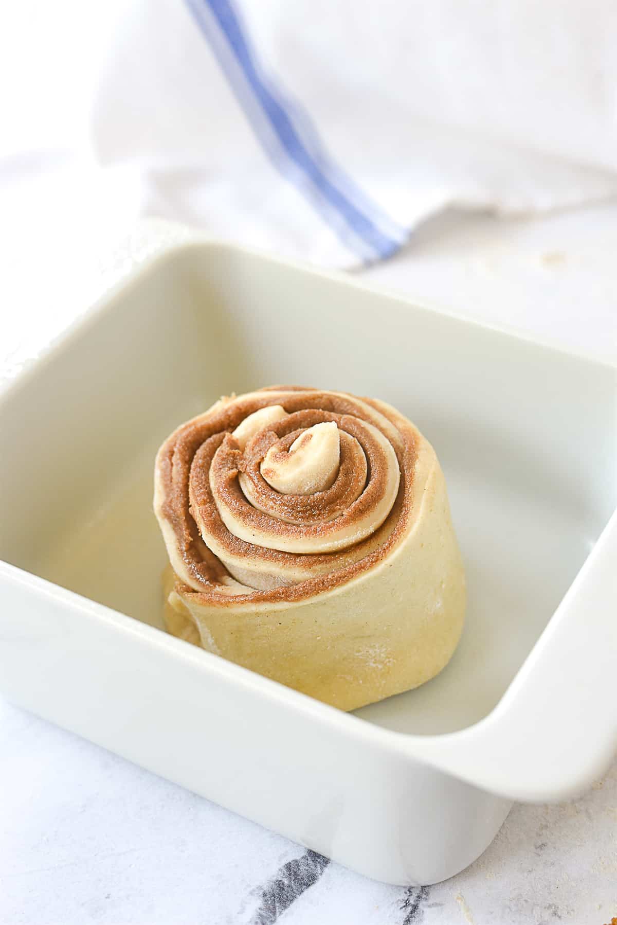 cinnamon roll in a baking dish