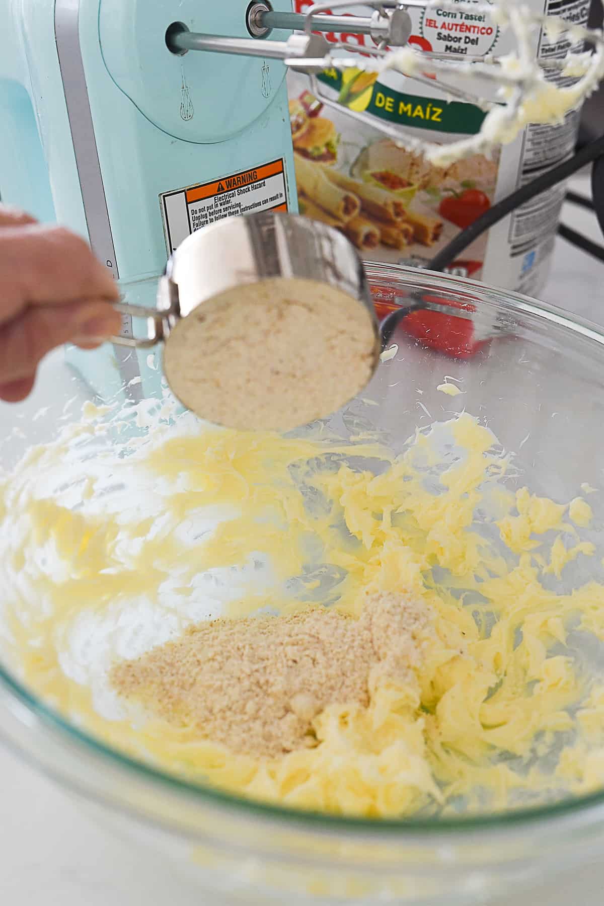 adding flour to butter mixture