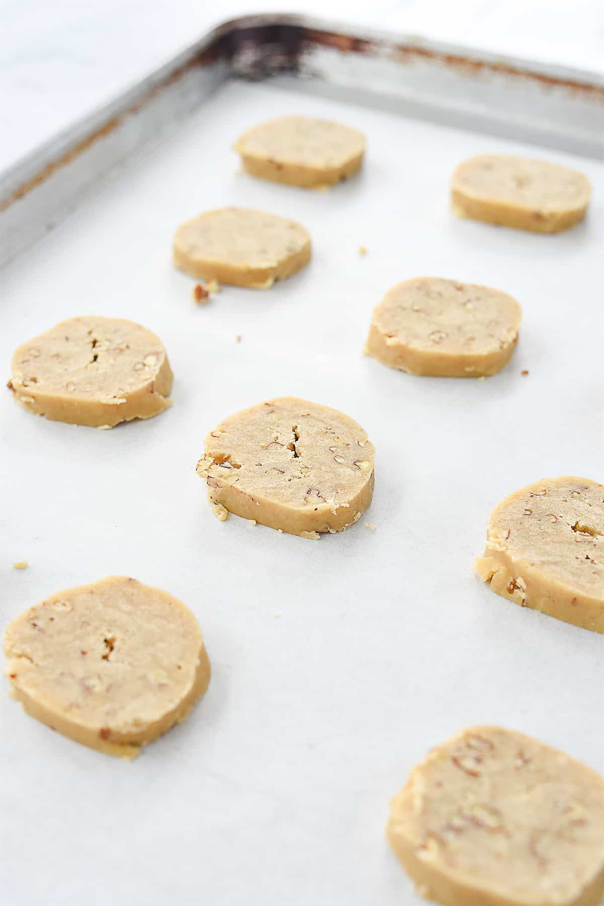 pecan sandies on baking sheet