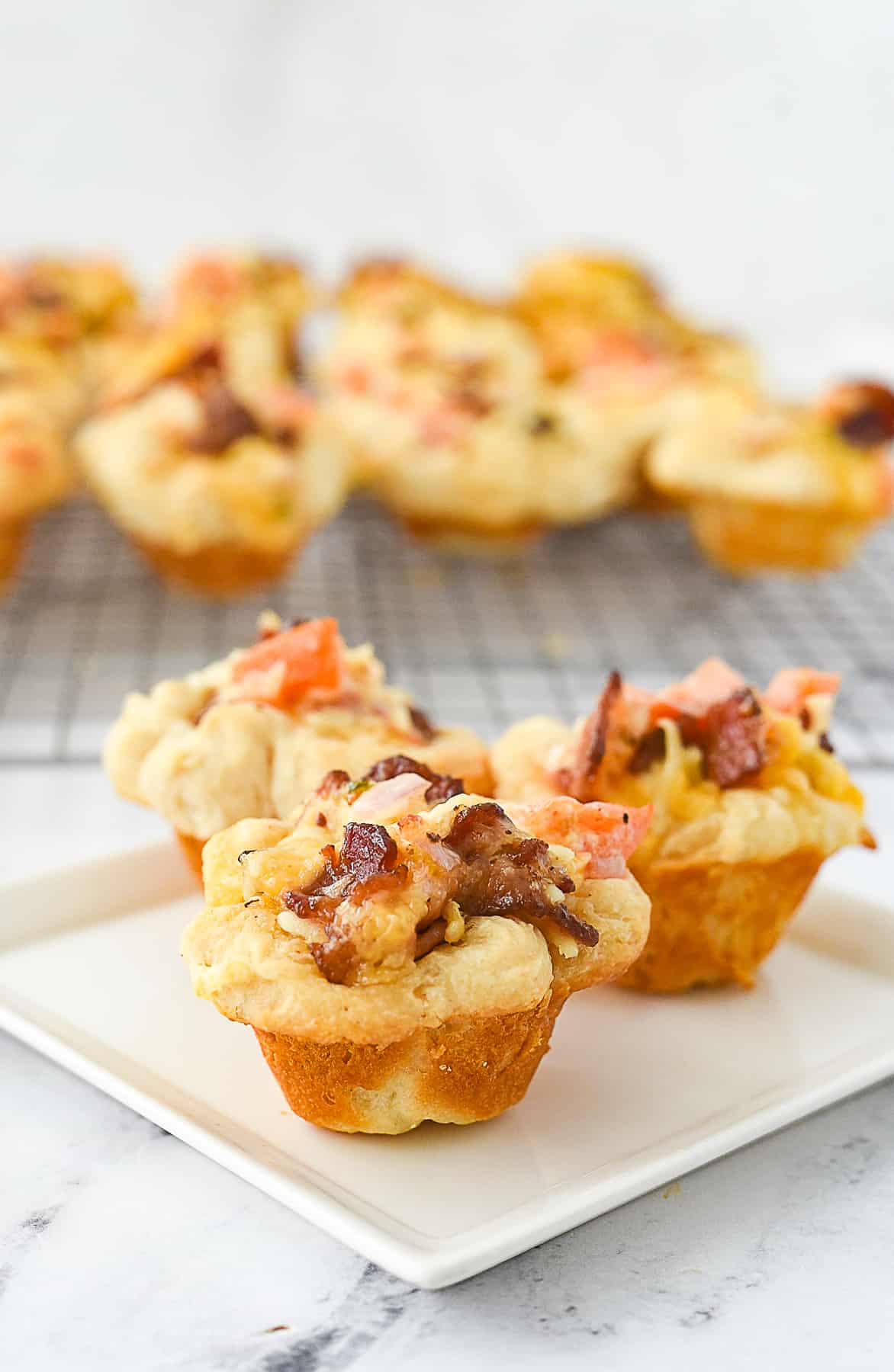 bacon tomato cups on a plate