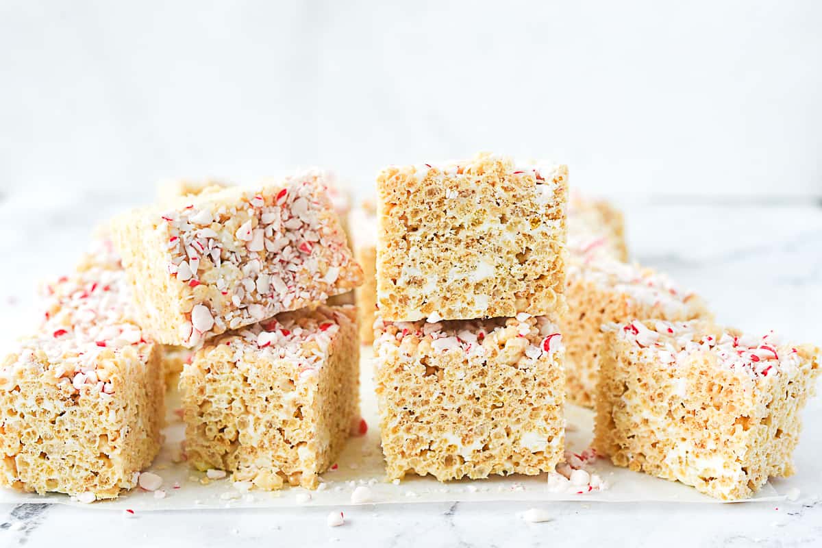 white chocolate peppermint rice krispie treats in a pile