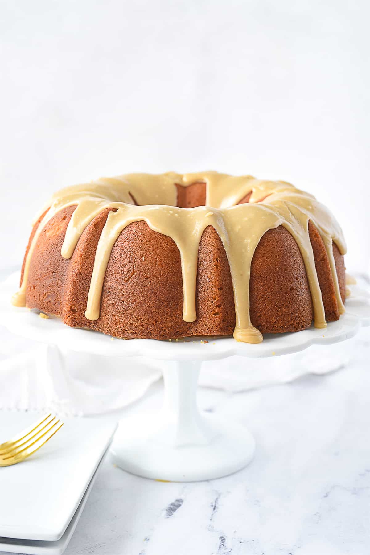 brown sugar cake on a cake stand