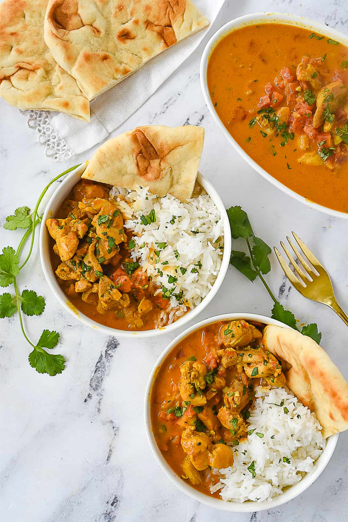 overhead shot of two bowls of curry