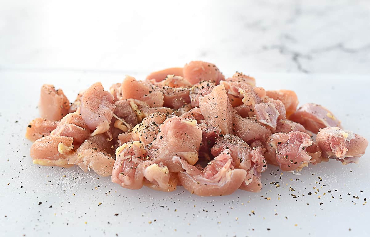 diced chicken on a cutting board